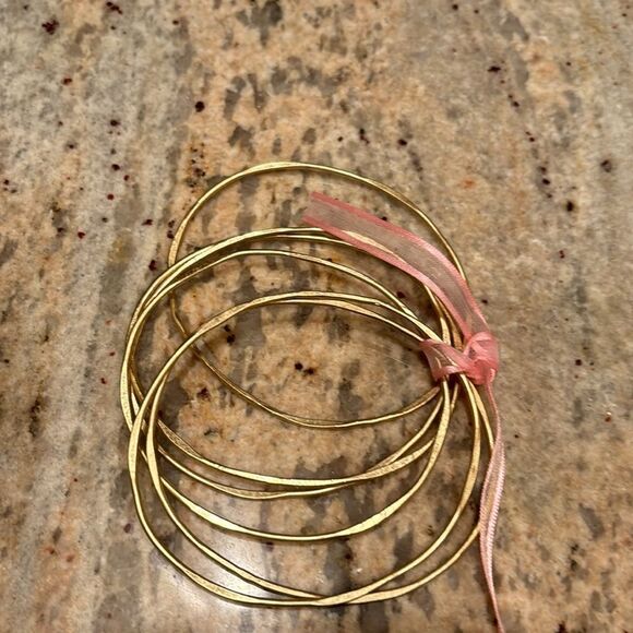 Woman's costume jewlery gold bracelets - Picture 2 of 4